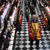 Soldiers of The Queen’s Company of the Grenadier Guards carry the coffin of Queen Elizabeth II