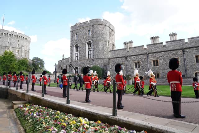 Soldiers from the Grenadier Guards at the Committal Service for Queen Elizabeth II held at St George's Chapel in Windsor Castle, Berkshire. Picture date: Monday September 19, 2022.