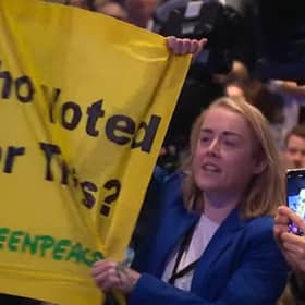 Protestors heckle Prime Minister Liz Truss during her keynote speech at the Conservative Party Conference 2022 in Birmingham.
