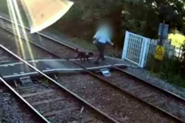 CCTV footage released by Network Rail capturing some of the reckless behaviour at a popular level crossing.