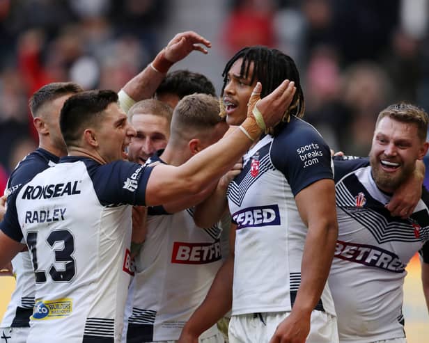 England celebrate Dom Young’s try against Samoa during World Cup opener