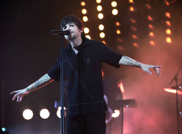 One Direction singer Louis Tomlinson reschedules in-store signing after breaking arm