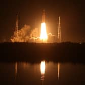 Artemis I Space Launch System (SLS) rocket, with the Orion capsule attached, launches at NASA's Kennedy Space Center on November 16