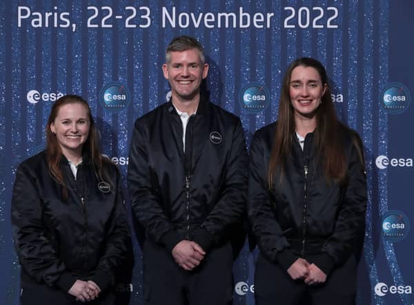 Meganne Christian (L), John McFall (C), and Rosemary Coogan (R) pose during a ceremony to unveil the European Space Agency new class of career astronauts in Paris on November 23, 2022