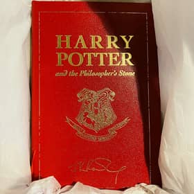 The leather-bound special 15th  anniversary edition of Harry Potter and the Philosophers Stone -  published exclusively for the competition in 2012.