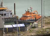 An RNLI life boat arrives back in port after taking part in a rescue mission in the English Channel.