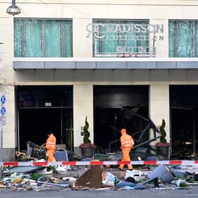 Berlin’s AquaDom aquarium containing 1,500 tropical fish bursts causing major flooding on nearby streets.