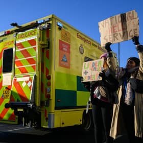 A group of fraudsters have been posing as ambulance staff and knocking on doors asking for financial support ahead of upcoming industrial action.