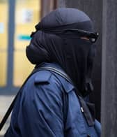 Xahra Saleem leaves Bristol Magistrates Court where she pleaded not guilty to two charges of fraud.
