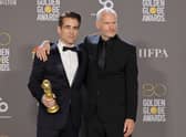  (L-R) Colin Farrell and Martin McDonagh, winners of Best Picture - Musical/Comedy for "The Banshees of Inisherin", pose in the press room during the 80th Annual Golden Globe Awards