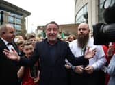 Michael Flatley, star of Riverdance and Lord of the Dance is mobbed by fans as he makes an appearance during the opening day of the World Irish Dancing Championships at the Waterfront Hall on April 10, 2022 in Belfast