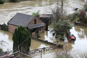 Houses in Ironbridge surrounded by flood waters as River Severn levels started to rise following heavy rain.