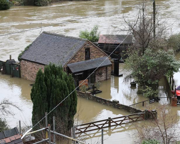 Houses in Ironbridge surrounded by flood waters as River Severn levels started to rise following heavy rain.