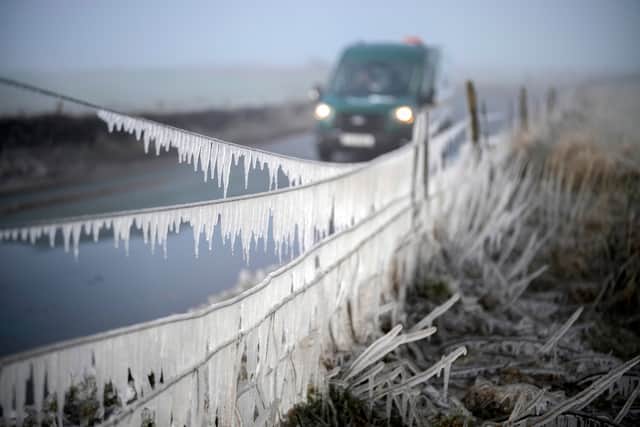 Splashes from a puddle create icicles on a hedgerow in sub-zero temperatures in Macclesfield.