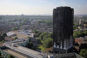 Grenfall tower continues to smoulder on June 15, 2017 in London, England