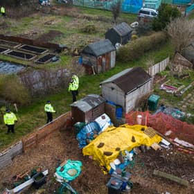 A police search team works through an allotment area as they continue to search for the missing baby in Brighton (Photo by Leon Neal/Getty Images).