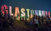 Festival-goers enjoy the atmosphere prior to the 2013 Glastonbury Festival at Worthy Farm. (Photo by Ian Gavan/Getty Images)