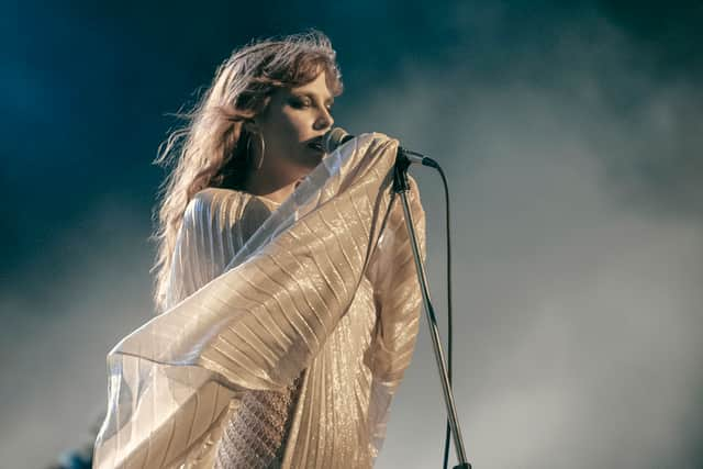 Riley Keough as Daisy Jones in Daisy Jones & The Six, performing in a style reminiscent of Stevie Nicks (Credit: Lacey Terrell/Prime Video)