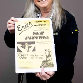 Claire Howell, music memorabilia consultant at Hansons Auctioneers, with the Sex Pistols poster.  