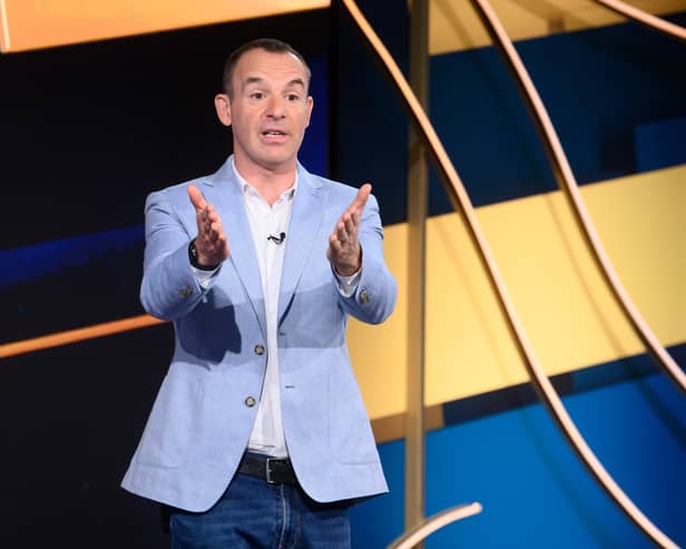 Martin Lewis pictured on set of The Martin Lewis Money Show, gesturing to the audience (Credit: Multistory Media/Jonathan Hordle/ITV)