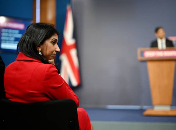 Suella Braverman listens on as prime minister Rishi Sunak announces the Illegal Migration Bill
