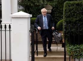 Former PM Boris Johnson leaving his home for the Commons Privileges Committee