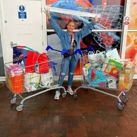 Only Fans star Amber O’Donnel at Tesco after shopping for her food parcel donations - Credit: SWNS