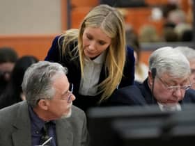 Gwyneth Paltrow appeared to whisper to Terry Sanderson after the verdict of her ski crash legal battle was revealed - Credit: Getty Images