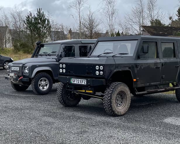 Munro EV, pictured beside a mid-teens Land Rover Defender at Gleneagles Estate