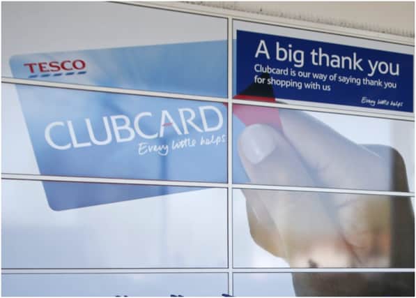 A man shops at a Tesco supermarket in Sunbury, west of London on April 22, 2015. Britain's biggest retailer, supermarket group Tesco, announced Wednesday that it had plunged massively into the red last year as it took a hit on the value of its property. AFP PHOTO / ADRIAN DENNIS (Photo credit should read ADRIAN DENNIS/AFP via Getty Images)