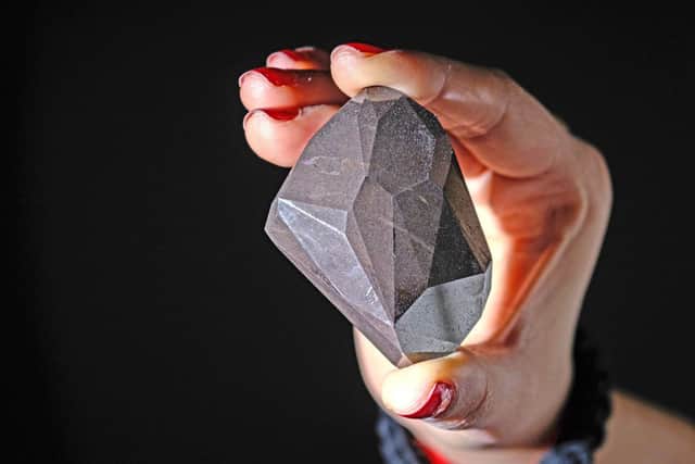 THE world's largest cut diamond, The Enigma, has sold for ÂŁ3.16m (photo: Leon Neal/Getty Images)