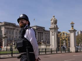 A Met Police officer outside Buckingham Palace, ahead of the Coronation. (Photo by Dan Kitwood/Getty Images)
