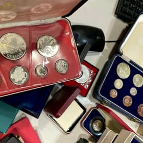 The secret collection, which includes a William III crown dating back to 1696, could fetch in excess of £17,500 at auction.
