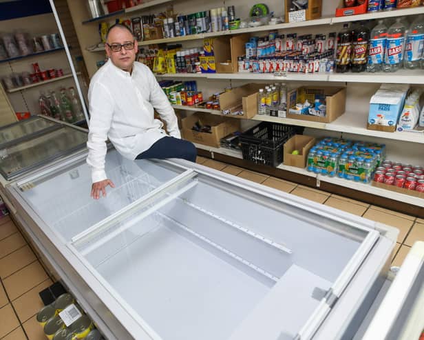 Ruhail Shahazad who owns Tremorfa Superstore in Cardiff has had to turn off 10 of his fridge and freezers in his shop, along with some of the lights, after his energy bills soared from £800 a month to £4,700. 