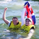 Hannah Mills (L) and Eilidh McIntyre of Team Great Britain celebrate following the Women's 470 class medal race on day twelve of the Tokyo 2020 Olympic Games (Photo by Clive Mason/Getty Images)