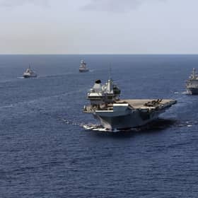 HMS Queen Elizabeth: How many have Covid on Navy flagship - and where is the Carrier Strike Group now? (Photo: PA)