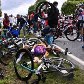 The entire pelaton came crashing down after a spectator reached out into the road with a placard (Photo: Getty Images)
