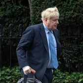 MPs have urged Boris Johnson to pay his own Partygate legal fees
