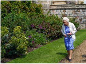 Queen Elizabeth II views a border in the gardens of Windsor Castle, where she received a Duke of Edinburgh rose, given to her by the Royal Horticultural Society (Photo by Steve Parsons - WPA Pool/Getty Images)