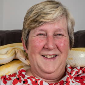 A woman who adopted a python following the death of her husband said she ‘felt an instant connection’ and the reptile brings her ‘so much joy’ 