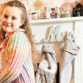 Little Angel-Mae Dawson has been left unable to walk properly after she was viciously mauled by a German Shephard outside her home in Meir, Stoke-on-Trent.