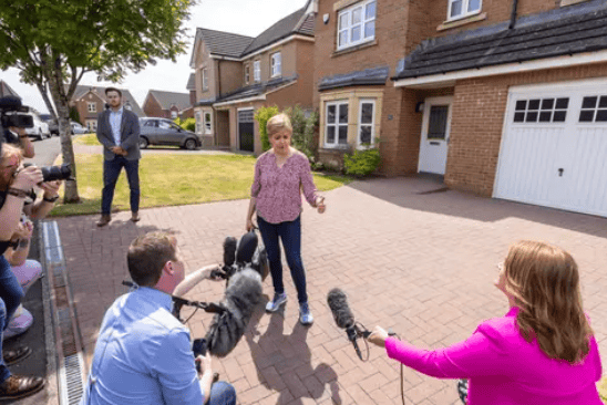 Former first minister of Scotland Nicola Sturgeon speaks to the media outside her home in Uddingston, Glasgow, following her arrest last week in the police investigation into the SNP's finances. The former first minister's arrest came after her husband Peter Murrell was arrested in April.