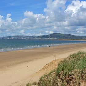 A teenager has died after getting in to trouble in the sea at Aberavon beach