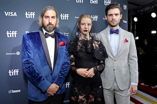 Pearl director Ti West with Mia Goth, and David Corenswet who both star in the film. Image: Getty