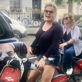 Suzy Eddie Izzard was spotted by a delighted fan careering around London on a Boris bike.