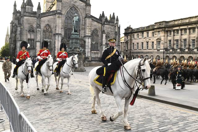 An early morning procession rehearsal takes place along the Royal Mile in Edinburgh, ahead of King Charles III’s Service of Thanksgiving.