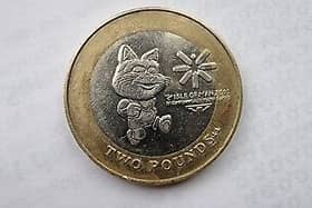 The £2 coin features the official mascot of the games, Tosha the Cat, as well as the logo of the games.