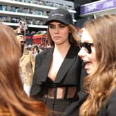 Cara Delevingne has hit back at F1 fans after an awkward encounter with Sky Sports presenter Martin Brundle