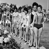 Contestants in the 1964 Miss Dunbar beauty pageant pose beside Dunbar Lido.