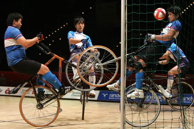 Men's cycle-ball athletes compete in the 2006 UCI Indoor Cycling World Championships. Image: UWE MEINHOLD/DDP/AFP via Getty Images
